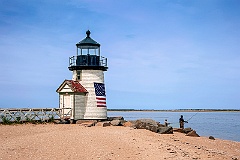 Fishing Off The Beach By Nantucket Island Lighthouse